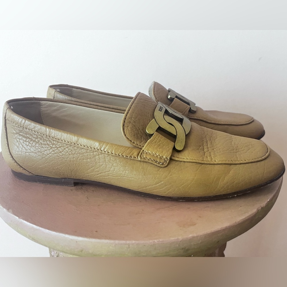 Tod’s “Kate” Gold Embellished Loafer